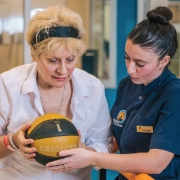 Older adults participating in a physiotherapy-led exercise class at Revive Physio and Aquatic Therapy Centre in Naxxar, Malta. The group is performing gentle strength and balance exercises under professional supervision to support mobility, independence, healthy ageing, and overall wellbeing.